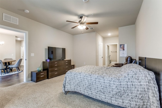 bedroom featuring ceiling fan and carpet floors