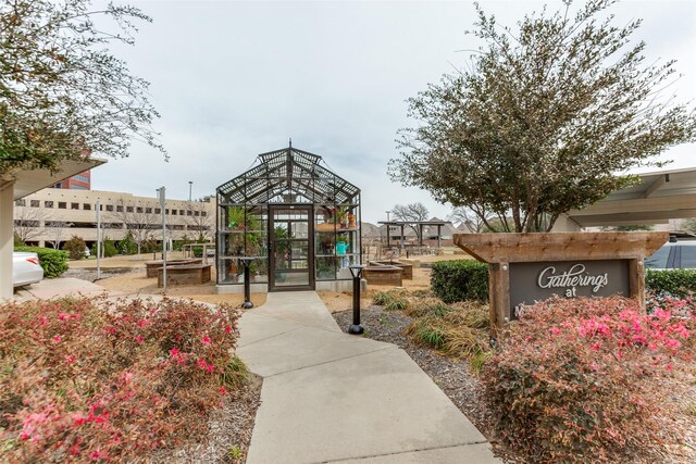 view of community with an outdoor structure