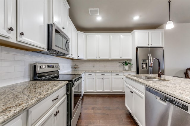 kitchen featuring white cabinetry, sink, and stainless steel appliances