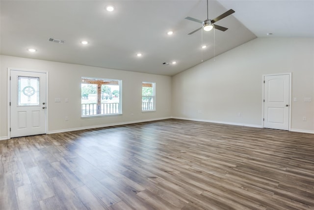 407 W Saunders St, Trenton, TX 75490 - unfurnished living room with plenty of natural light, a ceiling fan, lofted ceiling, wood finished floors, and baseboards