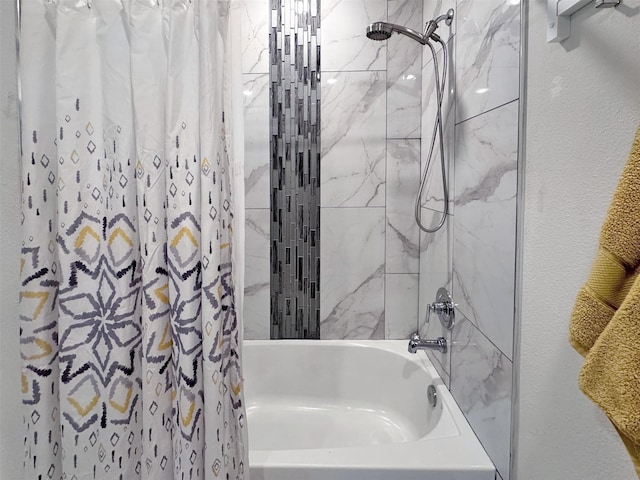 bathroom featuring shower / bath combo with shower curtain