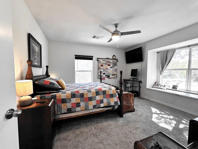 carpeted bedroom with ceiling fan