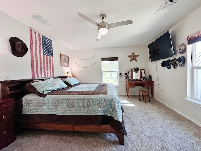 407 W Saunders St, Trenton, TX 75490 - carpeted bedroom with multiple windows, a ceiling fan, and baseboards