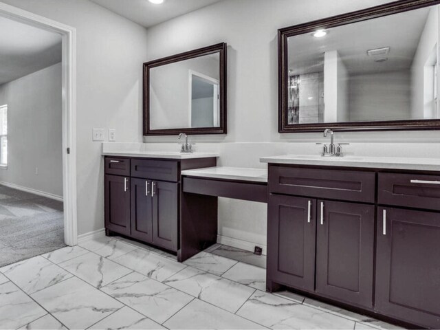 bathroom with ceiling fan, vanity, and a shower with shower door