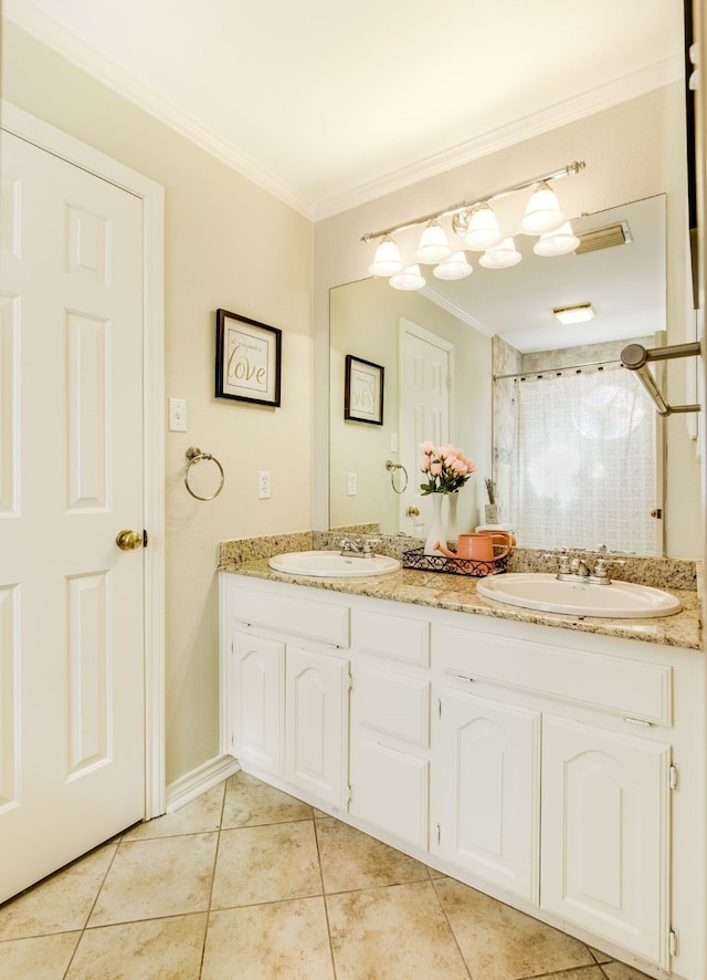 full bath with crown molding, double vanity, tile patterned floors, and a sink