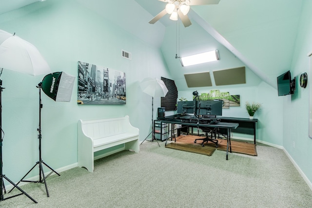 office featuring visible vents, baseboards, carpet, and vaulted ceiling