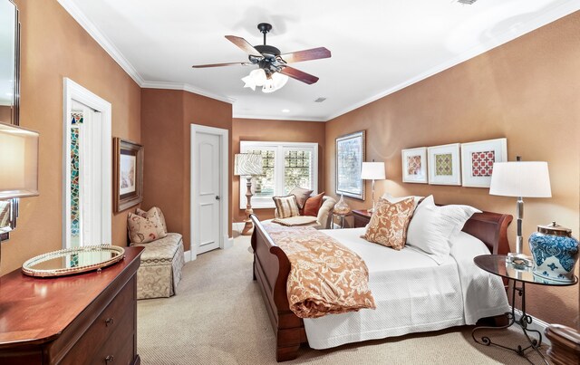 bedroom with light colored carpet, ceiling fan, and ornamental molding