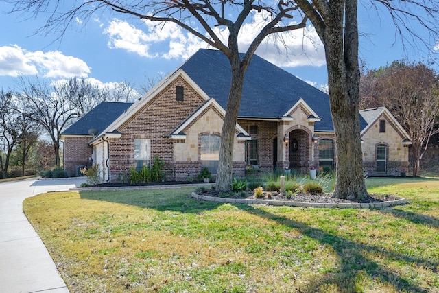 view of front of home with a front lawn