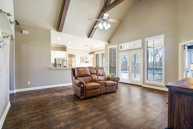 living room with french doors, beamed ceiling, high vaulted ceiling, dark hardwood / wood-style floors, and ceiling fan with notable chandelier