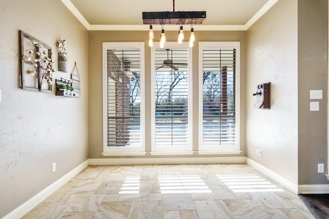 unfurnished dining area featuring a notable chandelier and ornamental molding