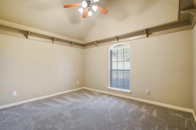 spare room featuring carpet flooring, ceiling fan, and high vaulted ceiling