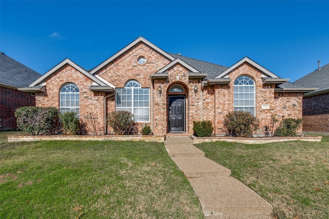 view of property with a front lawn