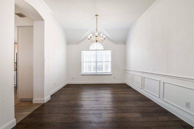 unfurnished room with crown molding, lofted ceiling, a chandelier, and dark wood-type flooring