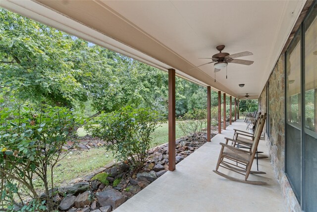 view of patio featuring ceiling fan