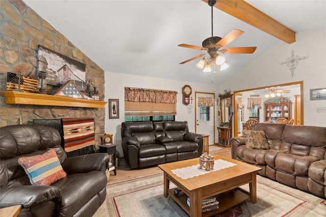 living room featuring ceiling fan, a fireplace, and vaulted ceiling with beams