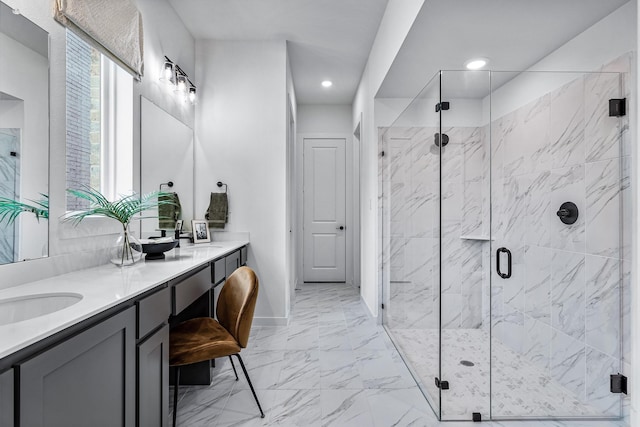 bathroom with vanity and an enclosed shower