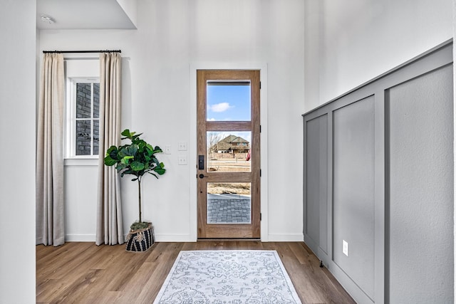 foyer with light hardwood / wood-style flooring