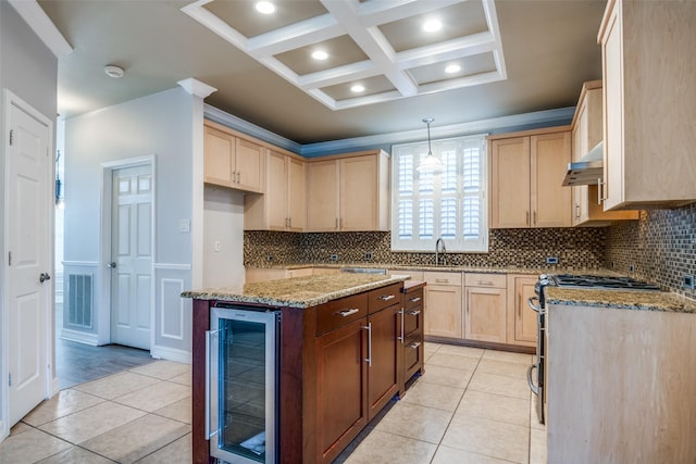 kitchen with light tile patterned floors, wine cooler, light stone counters, light brown cabinets, and exhaust hood