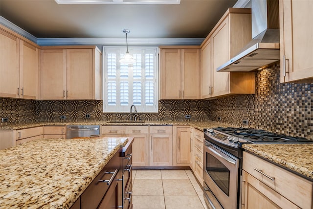 kitchen with wall chimney exhaust hood, light brown cabinets, stainless steel appliances, and a sink