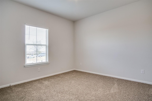 spare room with carpet flooring