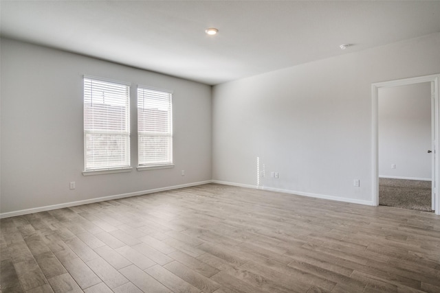 empty room with light wood-type flooring