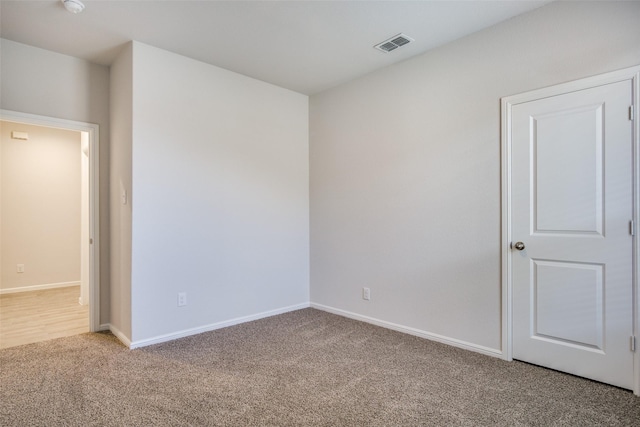 unfurnished room with carpet