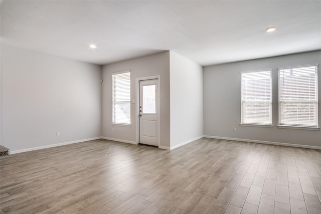 foyer entrance featuring light hardwood / wood-style flooring