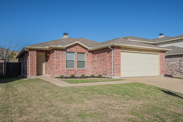 ranch-style home with a front lawn and a garage