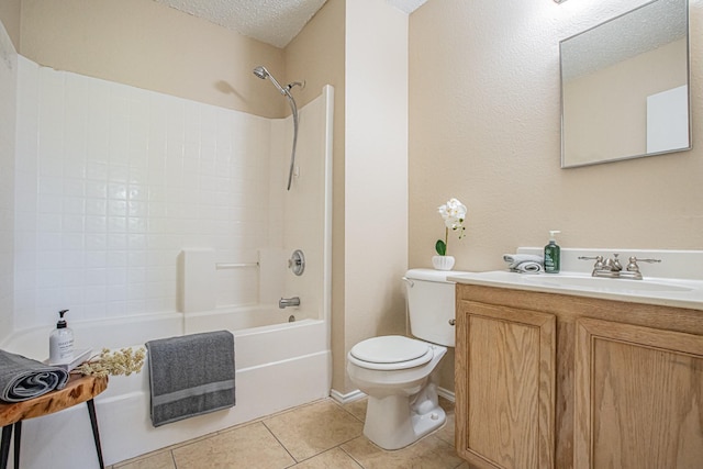 full bathroom featuring tile patterned floors, a textured ceiling, toilet, shower / tub combination, and vanity