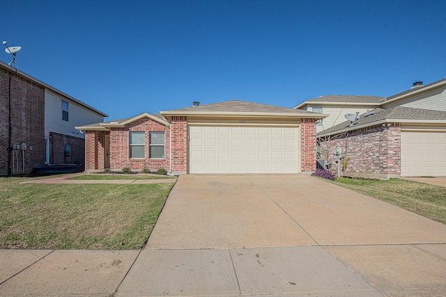 ranch-style home with a front lawn and a garage