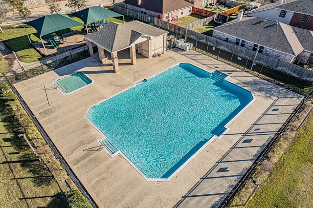 view of pool featuring a patio