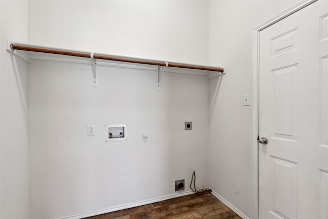 laundry area with hookup for a washing machine, dark hardwood / wood-style floors, gas dryer hookup, and hookup for an electric dryer