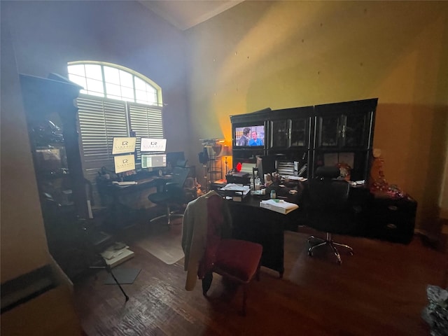 home office with wood-type flooring