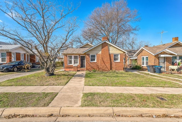 view of front facade with a front yard