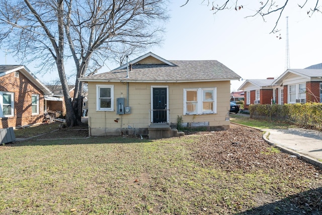 view of front of home with a front yard