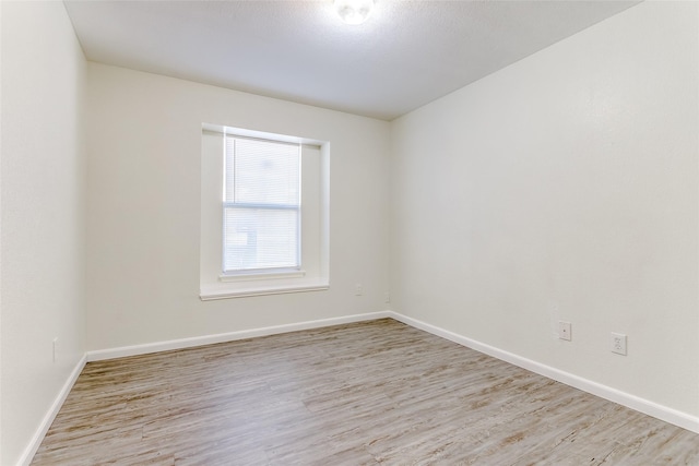 empty room featuring light hardwood / wood-style floors