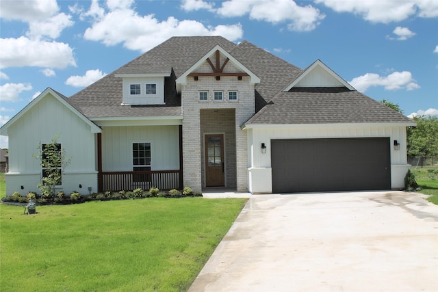 craftsman-style home featuring a garage and a front yard