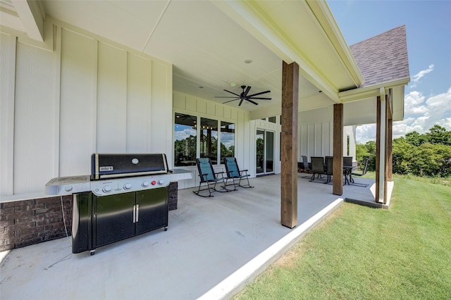 view of patio featuring ceiling fan and a grill