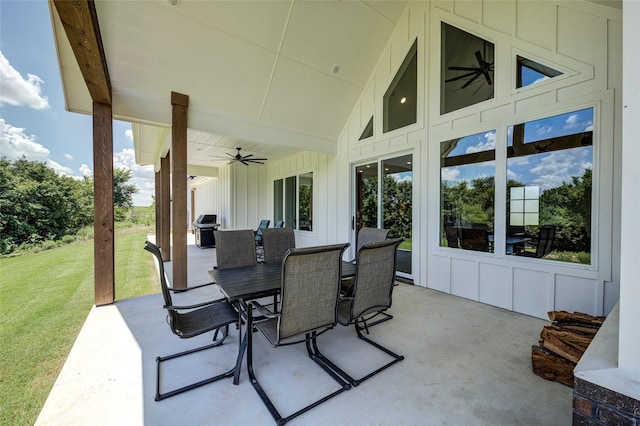 view of patio with area for grilling and ceiling fan