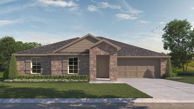 view of front of property with a front yard and a garage