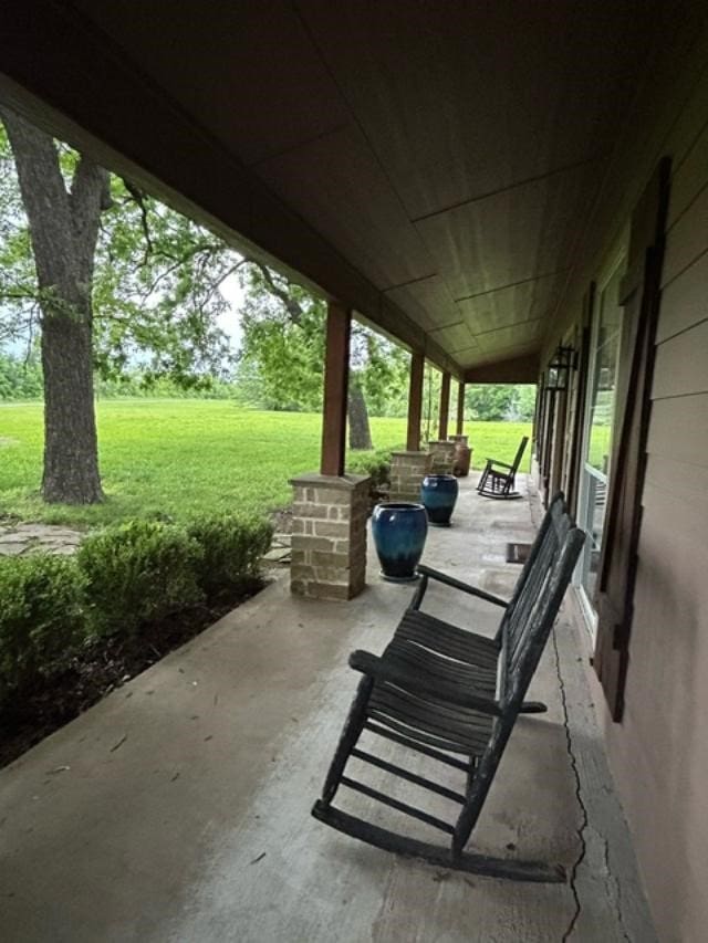 doorway to property featuring a porch