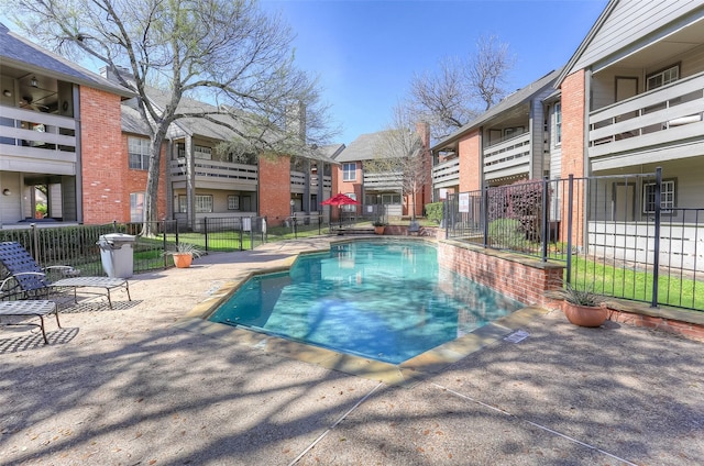 view of swimming pool featuring a patio area