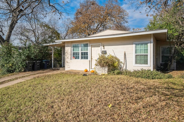 view of home's exterior featuring a lawn