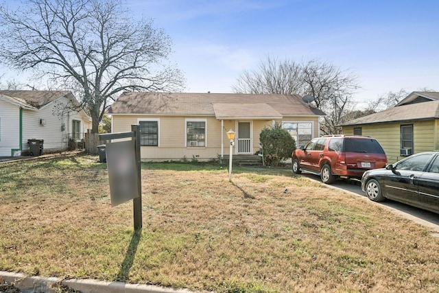 view of front of home with a front yard