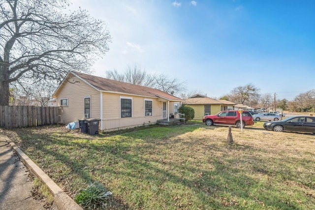 view of front of home with a front lawn