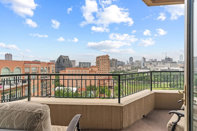 balcony featuring a view of city