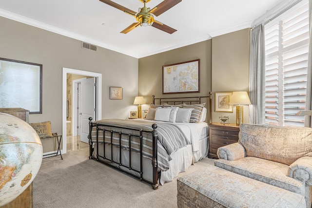 carpeted bedroom featuring ceiling fan and ornamental molding