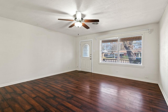 entryway featuring ceiling fan and dark hardwood / wood-style flooring