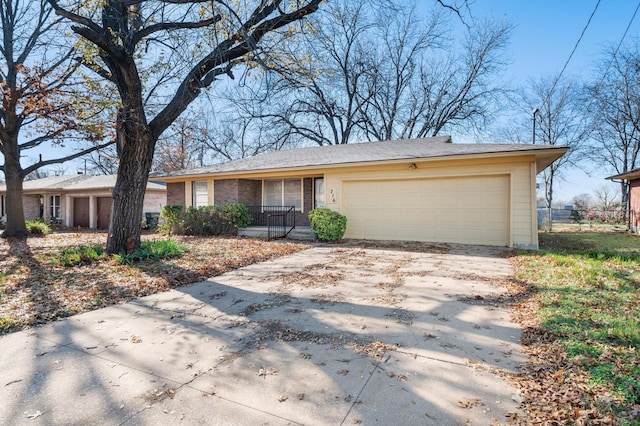 ranch-style house featuring a garage