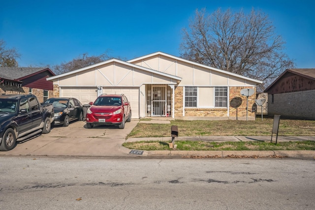 single story home featuring a garage